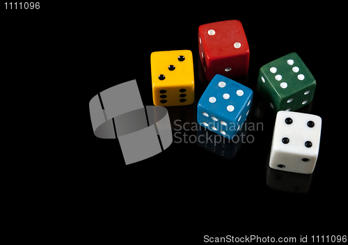 Image of Colorful dices on black background