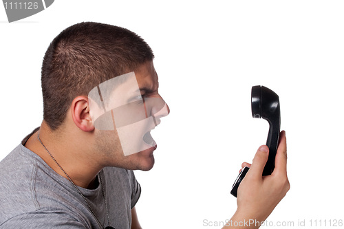 Image of Man Screaming Into the Telephone