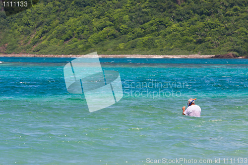 Image of Senior Citizen Snorkeling in Tropical Waters