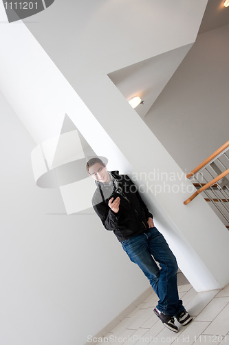 Image of Man Checking His Cell Phone