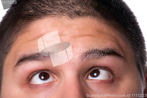 Image of Man Looking Upward at His Forehead