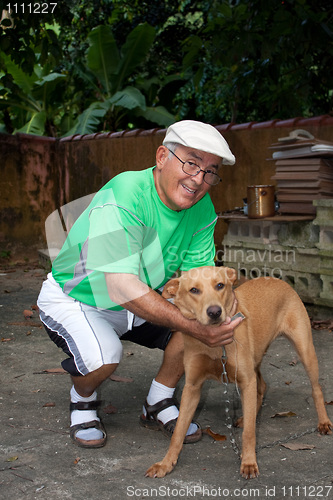 Image of Senior Citizen Man and His Dog