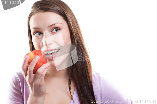Image of Woman eating apple