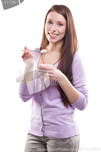 Image of Woman eating yogurt