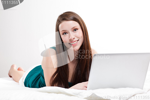 Image of Young woman with laptop