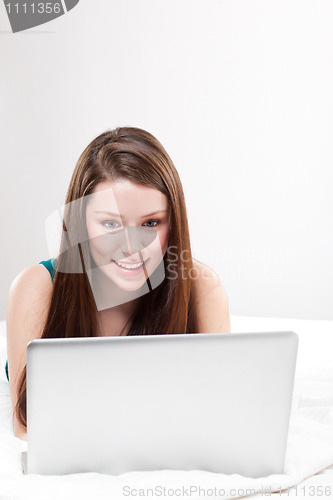 Image of Young woman with laptop