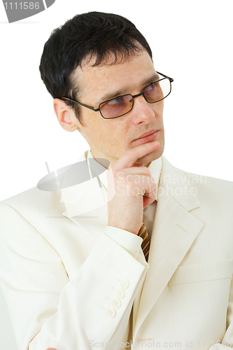 Image of Thinking young man in glasses