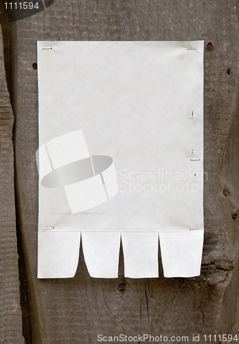 Image of Paper announcement on wooden fence - template