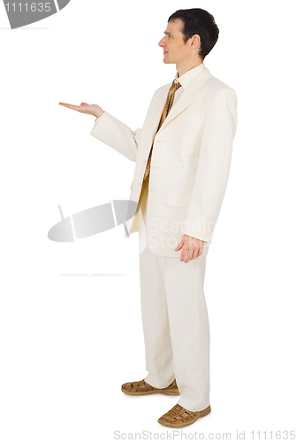 Image of Man holding something in hand