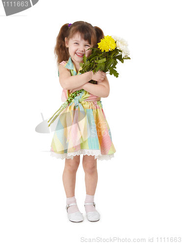 Image of Happy little girl with bouquet of flowers