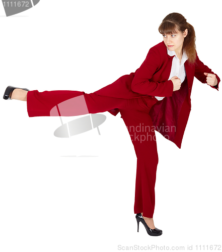 Image of Woman in business suit kicks back
