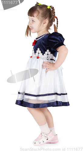 Image of Funny little girl in beautiful dress on white background