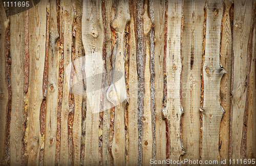 Image of Wooden fence made of boards and slabs - background