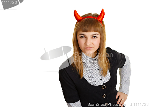 Image of Young woman with devil horns, sly looks