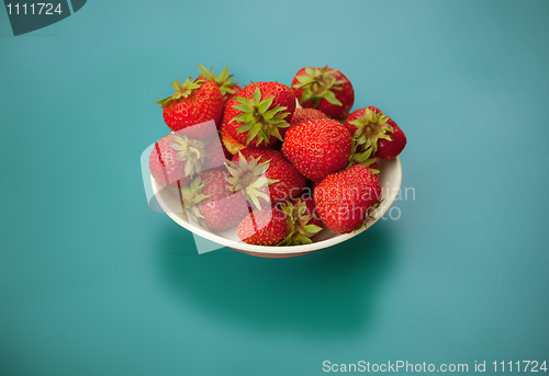 Image of Strawberries on blue background