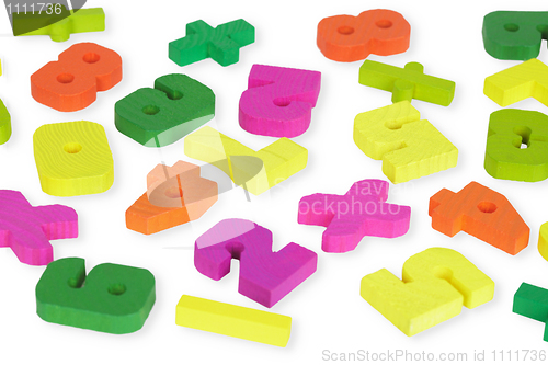 Image of Multi-colored wooden toy figures on white