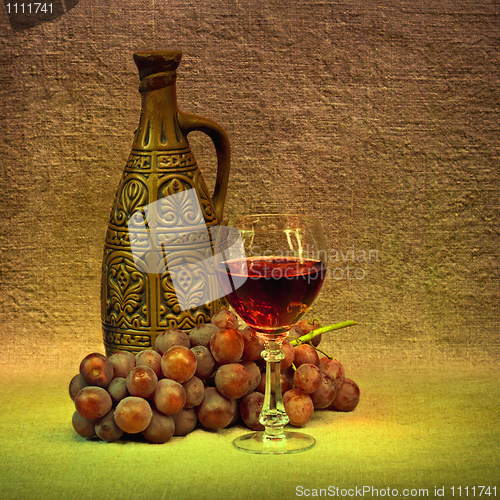 Image of Dark Still Life - clay bottle, glass and grapes