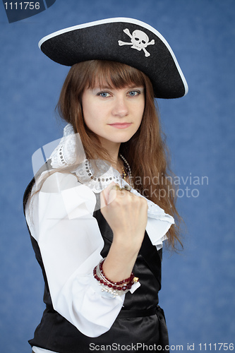 Image of Portrait of woman pirate on blue background