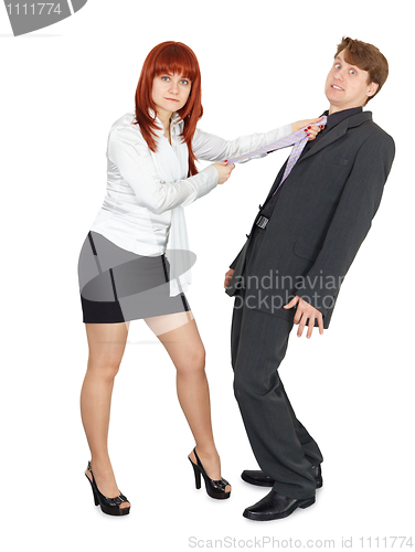 Image of Frightened man in hands of angry woman