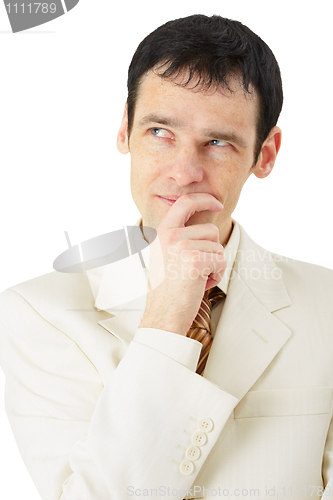 Image of Man in business suit intently thinking