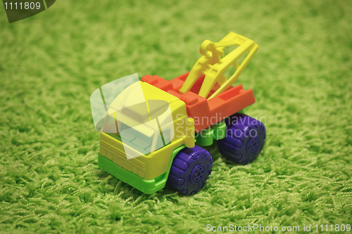 Image of Small toy - car on carpet