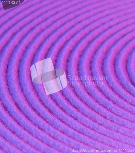Image of Abstract pattern - concentric circles on purple sand