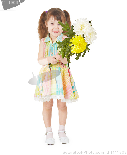 Image of Cheerful child waving a bouquet of flowers