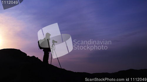 Image of Photographer at sunrise