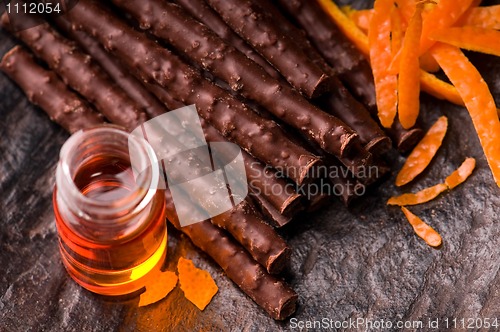 Image of chocolate sticks with orange