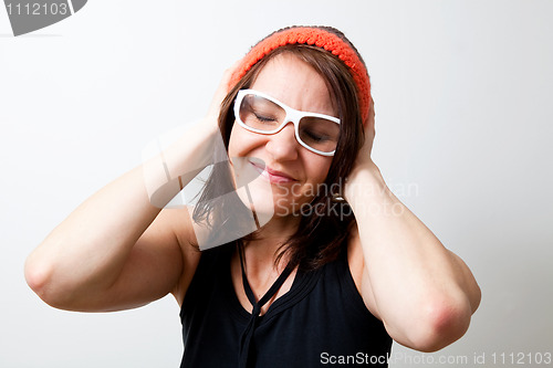 Image of Young trendy woman dreaming