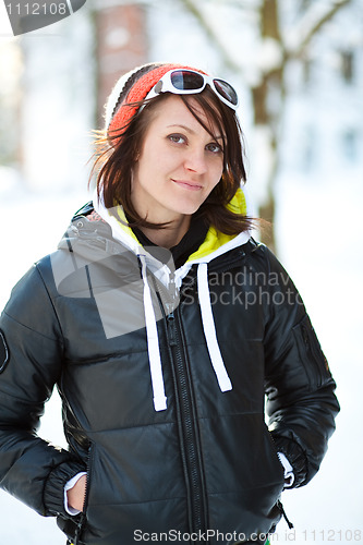 Image of Portrait of a trendy winter woman