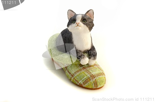 Image of ceramic cat on a slipper