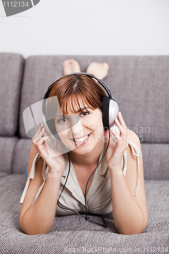 Image of Listening music at home