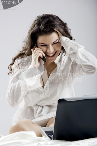 Image of Working on the bed