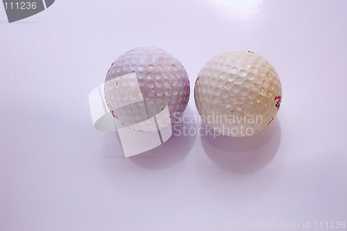 Image of old used golf balls