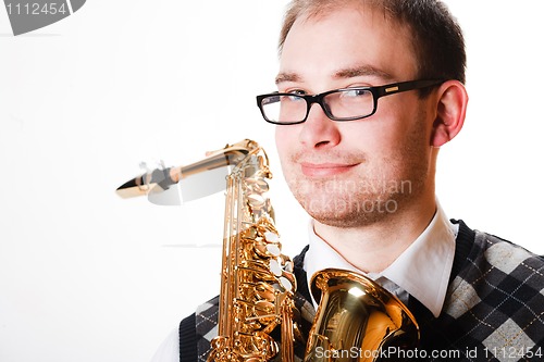 Image of man and saxophone