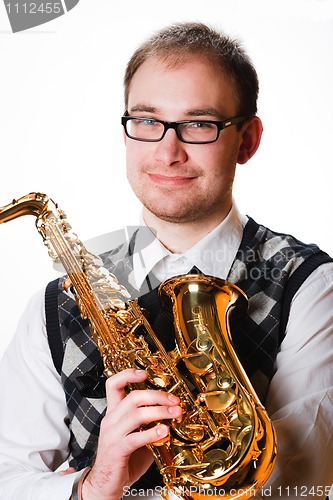 Image of man and saxophone