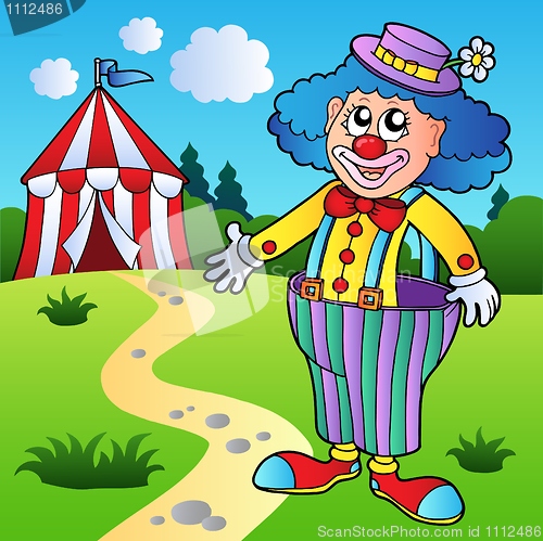 Image of Clown in big pants with circus tent