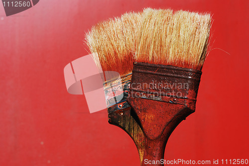 Image of dirty paintbrushes