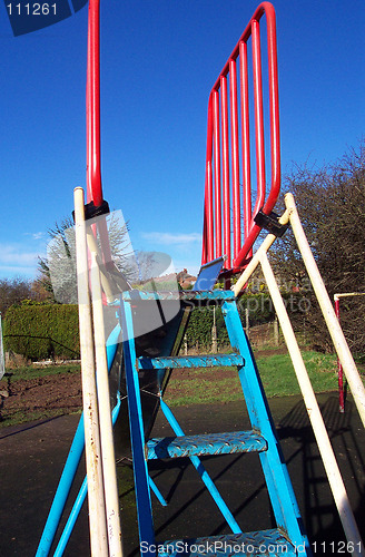 Image of steps of a slide on a park