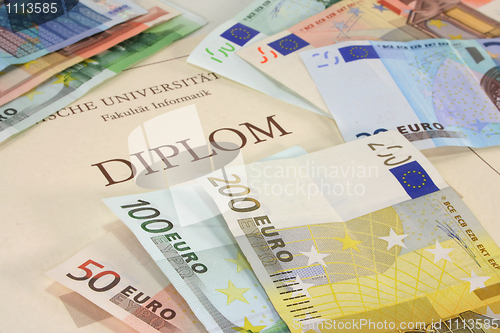 Image of diploma with euro notes