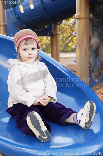 Image of Toddler girl on slider