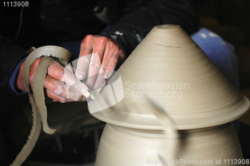 Image of Making a porcelain vase with clay