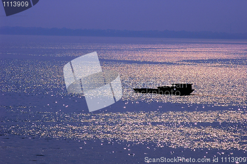 Image of Fishing boat in lake