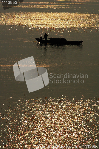 Image of Fishing boat in lake