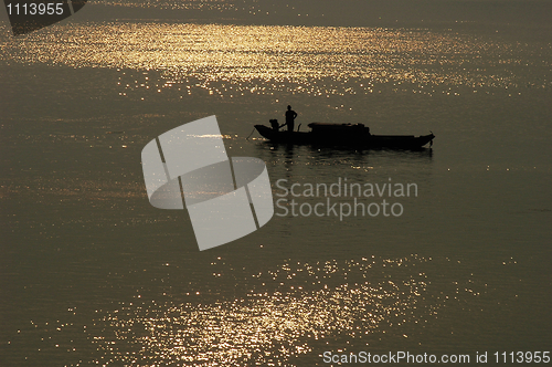Image of Fishing boat in lake