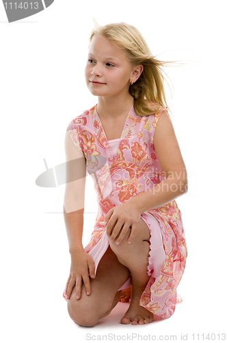 Image of blond girl posing in studio