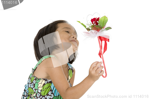 Image of cute girl with flower gift