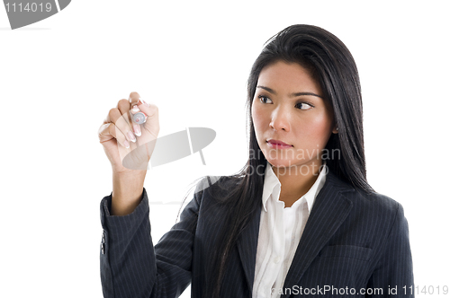 Image of businesswoman writing with a red marker