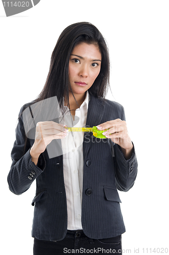 Image of business woman with ruler 